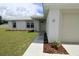 Lovely single-story home featuring an attached two-car garage and landscaped front yard at 9 Hemlock Terrace Ln, Ocala, FL 34472