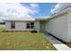 Inviting one story home with fresh landscaping, walkway, and covered entryway at 9 Hemlock Terrace Ln, Ocala, FL 34472