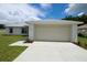 Charming single-story home featuring a two-car garage and freshly landscaped front yard at 9 Hemlock Terrace Ln, Ocala, FL 34472