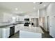 Close up of a modern kitchen with granite countertops, and stainless steel appliances at 9 Hemlock Terrace Ln, Ocala, FL 34472
