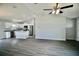 Modern kitchen with white cabinets, stainless steel appliances, and an eat in island at 9 Hemlock Terrace Ln, Ocala, FL 34472
