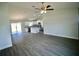 Open-concept living space features a modern kitchen with stainless steel appliances at 9 Hemlock Terrace Ln, Ocala, FL 34472