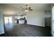Open-concept living space features a modern kitchen with stainless steel appliances at 9 Hemlock Terrace Ln, Ocala, FL 34472