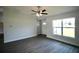 Bright living room features contemporary flooring, and a large window at 9 Hemlock Terrace Ln, Ocala, FL 34472