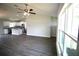 Open-concept living space features a modern kitchen with stainless steel appliances and eat in island at 9 Hemlock Terrace Ln, Ocala, FL 34472