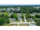 A beautiful aerial view of a peaceful neighborhood surrounded by mature trees and well-maintained homes at 5018 Se 106Th Pl, Belleview, FL 34420