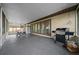 Enclosed patio space perfect for outdoor dining and grilling, with doors leading inside at 5018 Se 106Th Pl, Belleview, FL 34420