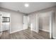 Bedroom with a doorway to an adjacent bathroom and an open closet at 6021 Nw 54Th Ter, Ocala, FL 34482