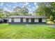 Charming single-story home with a well-maintained lawn and inviting curb appeal at 6021 Nw 54Th Ter, Ocala, FL 34482