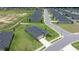 Aerial view of the house in a neighborhood showcasing the roof, lawn, and surrounding homes at 7828 Sw 74Th Loop, Ocala, FL 34481