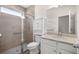 Bathroom featuring a glass enclosed shower, cabinet, and single sink vanity at 7828 Sw 74Th Loop, Ocala, FL 34481