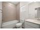Bright bathroom featuring a shower and bathtub combination with tiled wall and a single sink vanity at 7828 Sw 74Th Loop, Ocala, FL 34481