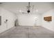 Spacious garage with water heater and access door at 7828 Sw 74Th Loop, Ocala, FL 34481
