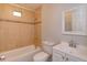 Bathroom featuring a tub and shower with decorative tile, modern vanity and fixtures at 956 Osceola Trl, Casselberry, FL 32707