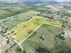 Vast aerial perspective of property showing pastures, ponds, and location within the property line at 4880 Bannon Island Rd, Haines City, FL 33844
