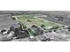 Expansive aerial view of property, featuring lush pastureland, ponds, and mature trees within the property line at 4880 Bannon Island Rd, Haines City, FL 33844