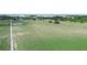 Beautiful expansive grassy land including pond, scattered trees and ample space at 4880 Bannon Island Rd, Haines City, FL 33844