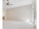 Spacious bedroom with carpeted floor and sliding door access at 3082 Landings Ct, Haines City, FL 33844