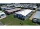 Birds-eye view of mobile home in a neatly arranged neighborhood, showcasing the home's exterior at 6739 Kensington Ne Dr, Winter Haven, FL 33881