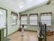 Bright entryway with natural light, stylish tile flooring, and access to the main living area and other rooms at 6739 Kensington Ne Dr, Winter Haven, FL 33881