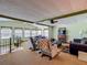 Spacious living area with a cozy seating arrangement and lots of natural light at 6739 Kensington Ne Dr, Winter Haven, FL 33881