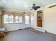 Relaxing sunroom with lots of natural light with views from three large windows at 6739 Kensington Ne Dr, Winter Haven, FL 33881