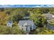 Aerial view of a house with a pool and detached garage at 907 Cornelia Ave, Lakeland, FL 33803