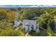 Aerial view of a house with a pool and detached garage at 907 Cornelia Ave, Lakeland, FL 33803