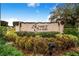 Sunset Chase community entrance sign with landscaping at 1518 Blue Sky Blvd, Haines City, FL 33844