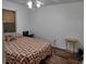 Bedroom with natural light, a ceiling fan, and wood-look floors at 4450 Old Berkley Rd, Auburndale, FL 33823