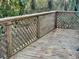A wooden deck with diamond pattern railing at 4450 Old Berkley Rd, Auburndale, FL 33823