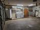 Spacious garage with a laundry area ready for vehicles at 4450 Old Berkley Rd, Auburndale, FL 33823