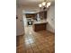 Open kitchen concept with tile flooring and matching wood cabinets at 4450 Old Berkley Rd, Auburndale, FL 33823