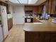 Charming kitchen features ample countertop space and modern appliances at 4450 Old Berkley Rd, Auburndale, FL 33823