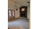 Inviting living room features a stone fireplace and a ceiling fan at 4450 Old Berkley Rd, Auburndale, FL 33823