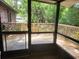 Inviting screened porch overlooking the yard at 4450 Old Berkley Rd, Auburndale, FL 33823