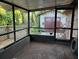 Enclosed patio providing ample space for relaxation at 4450 Old Berkley Rd, Auburndale, FL 33823
