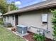 Exterior view showing the home's generator and attached equipment on the home's side at 416 Sandestin Dr, Winter Haven, FL 33884