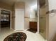 Bathroom with vanity, mirror, glass shower and tile flooring at 4577 Back Nine Dr, Winter Haven, FL 33884