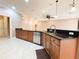 Spacious kitchen with granite countertops, stainless steel appliances, and an open layout at 4577 Back Nine Dr, Winter Haven, FL 33884