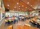 Spacious restaurant featuring wood ceiling, multiple tables, and an inviting ambiance at 4577 Back Nine Dr, Winter Haven, FL 33884
