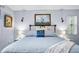 Main bedroom with king-size bed and nautical decor at 6168 Arborea Dr, Lake Wales, FL 33898