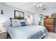 Bedroom with king-size bed, dresser and nautical theme at 6168 Arborea Dr, Lake Wales, FL 33898