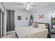 Bedroom with full bed, dresser and nautical decor at 6168 Arborea Dr, Lake Wales, FL 33898