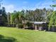 Private dock with a covered seating area on the water at 6168 Arborea Dr, Lake Wales, FL 33898