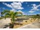 Relaxing seating area with fountain near the lake at 6168 Arborea Dr, Lake Wales, FL 33898