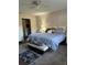 Spacious bedroom with plush bedding and ample closet space at 680 Augusta Rd, Winter Haven, FL 33884