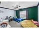 Bright bedroom with a large window, a bed, and a fun drum set at 1396 Lucerne Loop Ne Rd, Winter Haven, FL 33881