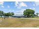 Lovely blue home with fenced yard near a lake at 1396 Lucerne Loop Ne Rd, Winter Haven, FL 33881