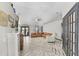 Bright and airy living room with vaulted ceiling and a cozy seating area at 1396 Lucerne Loop Ne Rd, Winter Haven, FL 33881